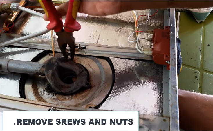 Step 4: Place Stove Upside Down and Remove Nuts